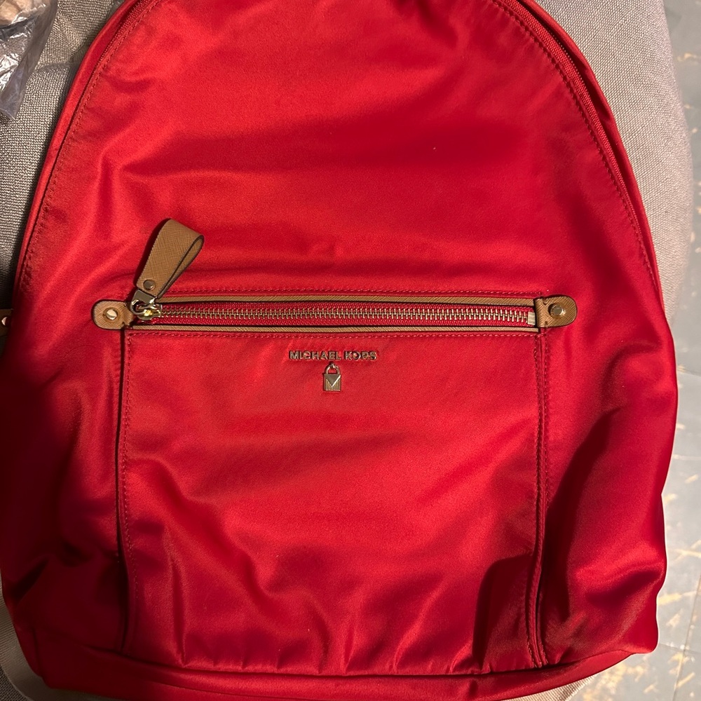 Michael Kors red nylon gabardine material backpack. LIKE NEW Used a few times.